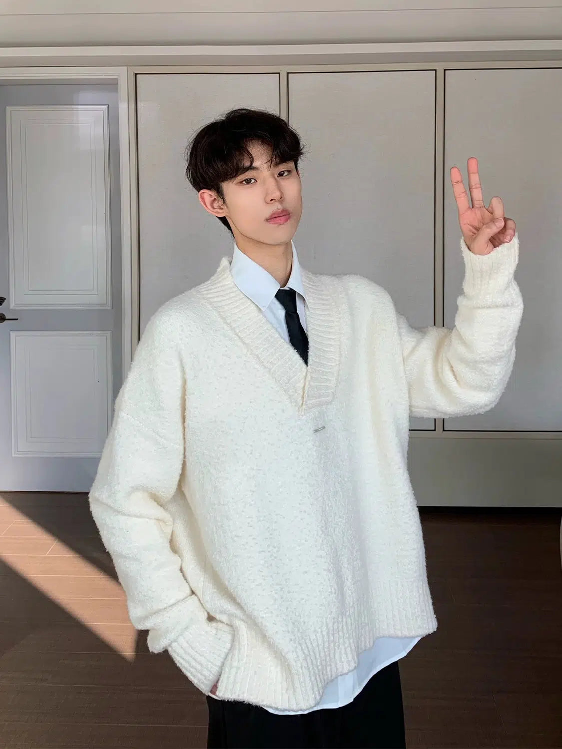 Maxct College Loose-fit V-neck Sweater